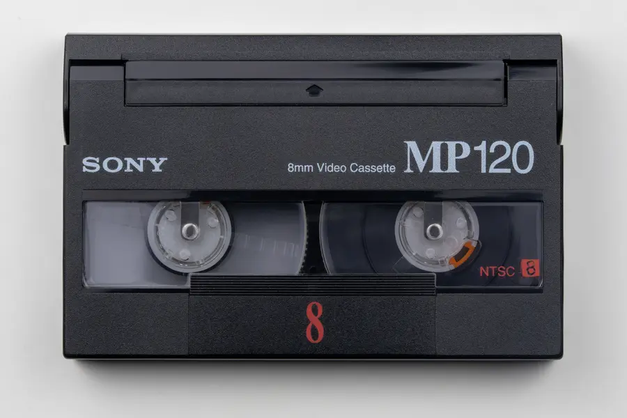 Video8 8mm camcorder cassette marked with a red number eight